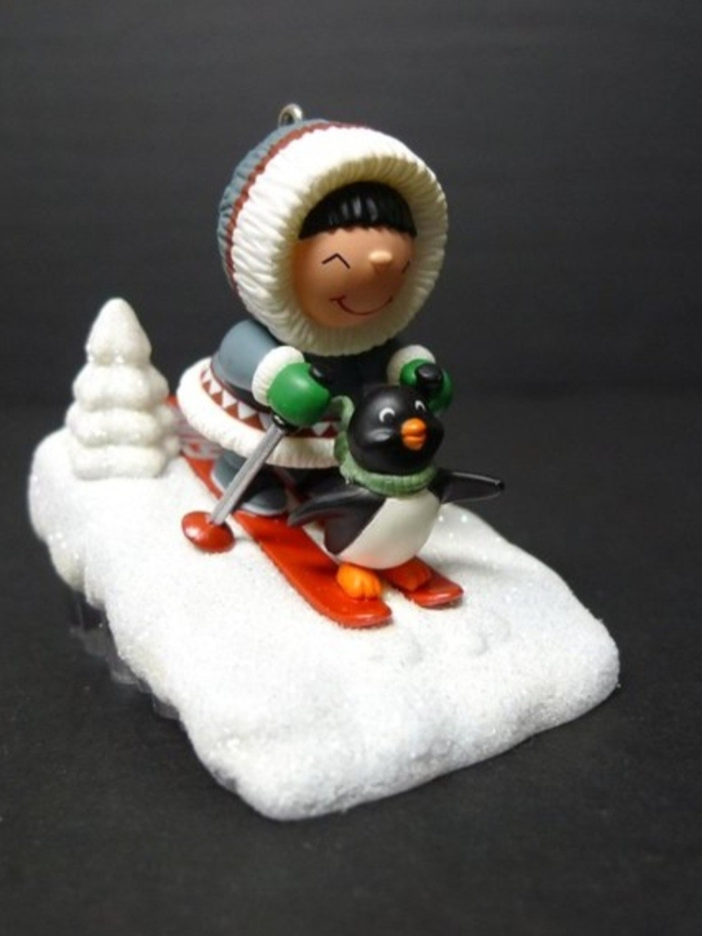 Hallmark 2009 Keepsake Frosty Friends Eskimo Child and Penguin Ski Ornament